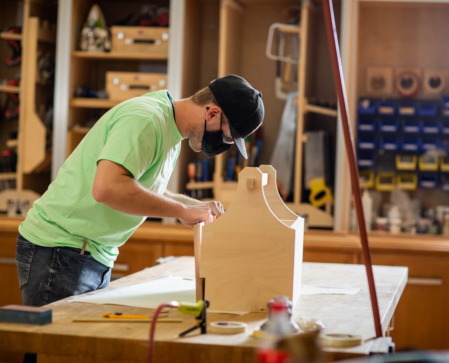 student competes in carpentry