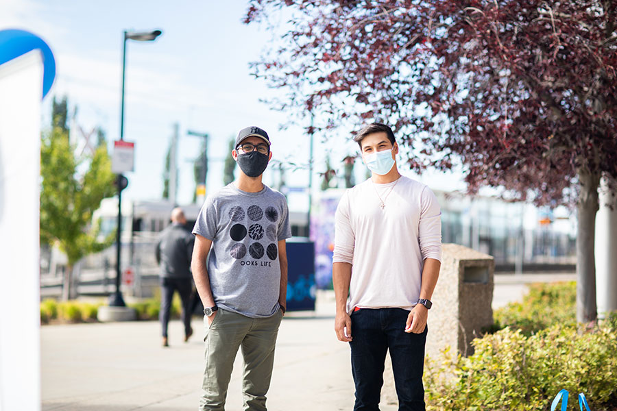 nait students outdoors in masks