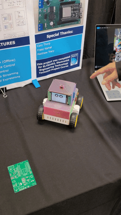 a small toy robot that looks like a truck spins after it is touched by someone's hand