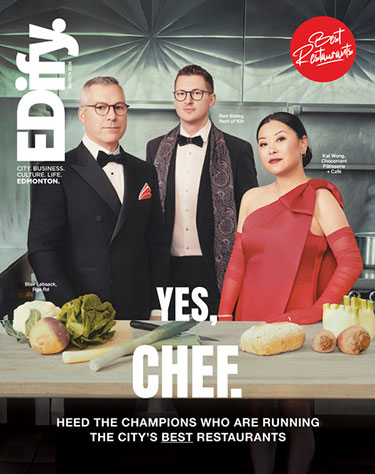 Three chefs in formal attire stand behind a table of fresh ingredients on the cover of EDify magazine, featuring the headline “YES, CHEF.” and a Best Restaurants badge.