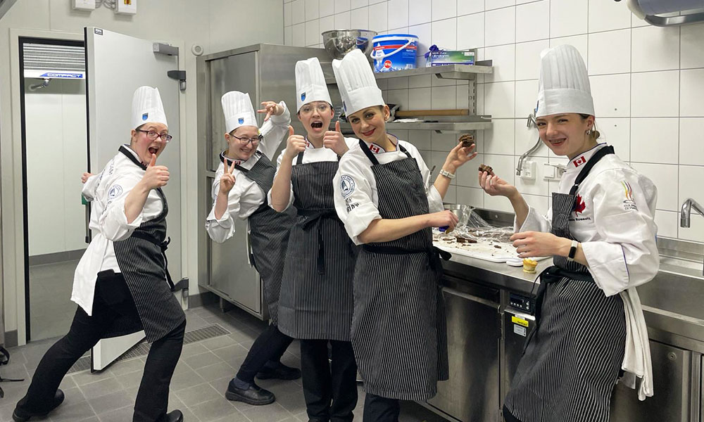 nait culinary team having fun in the kitchen at the IKA culinary olympics