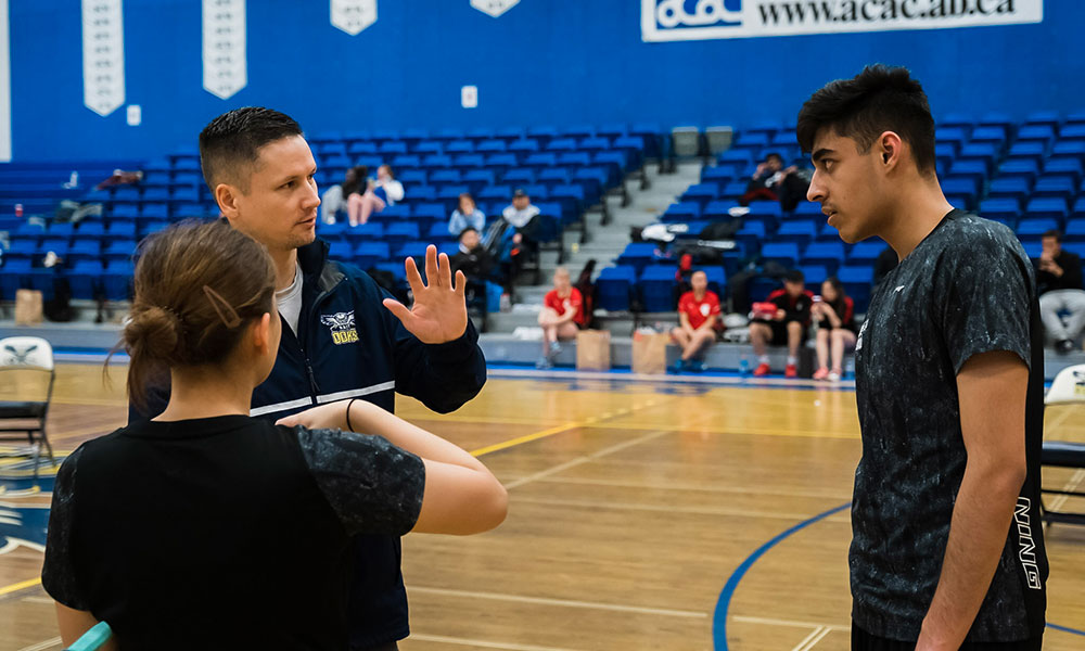 allan chow, nait badminton coach with student athletes