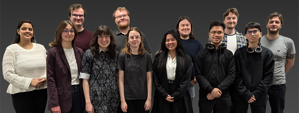 group photo of 12 young people on a drak grey background