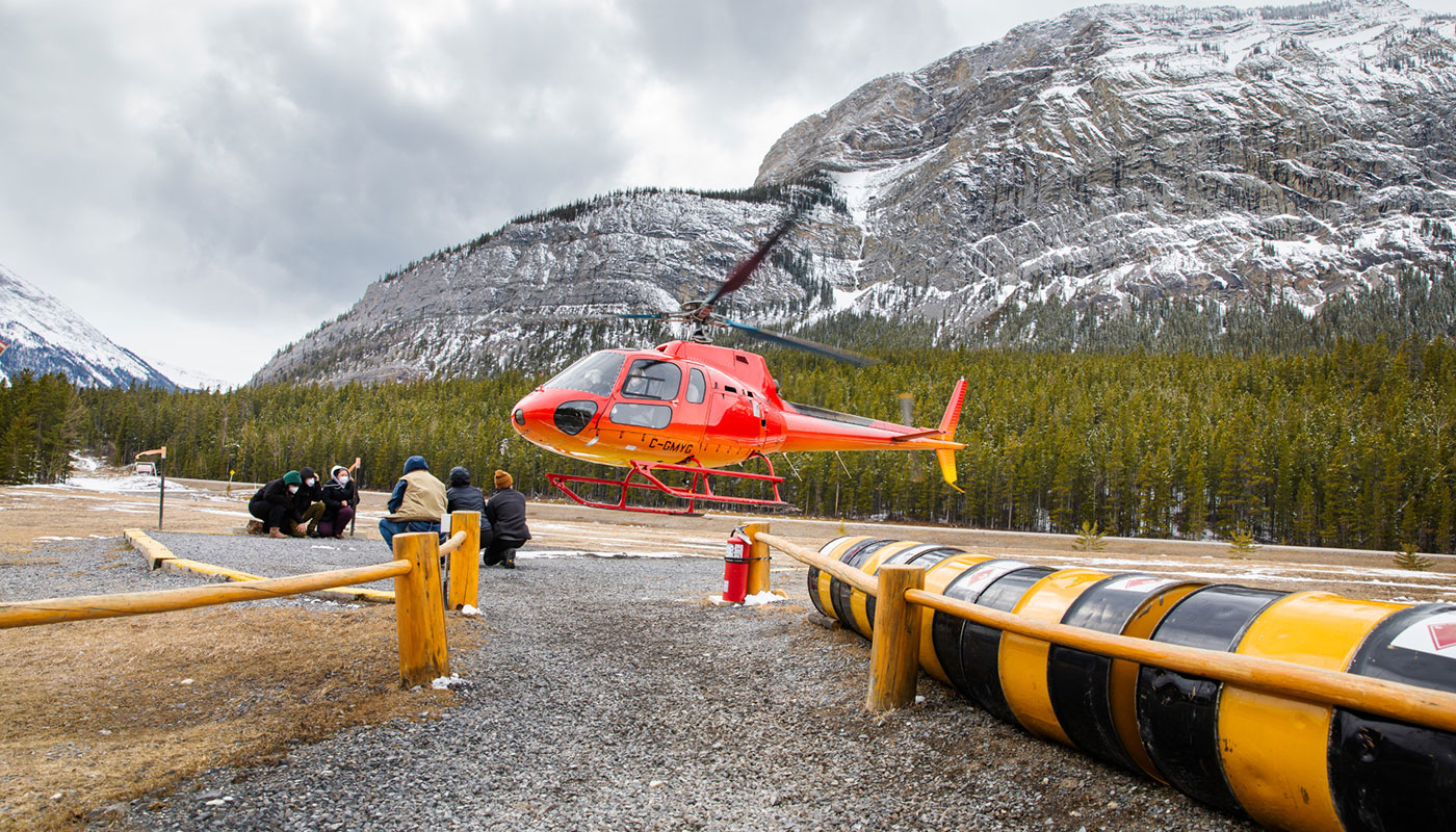 nait conservation biology students practise boarding a helicopter near nordegg alberta