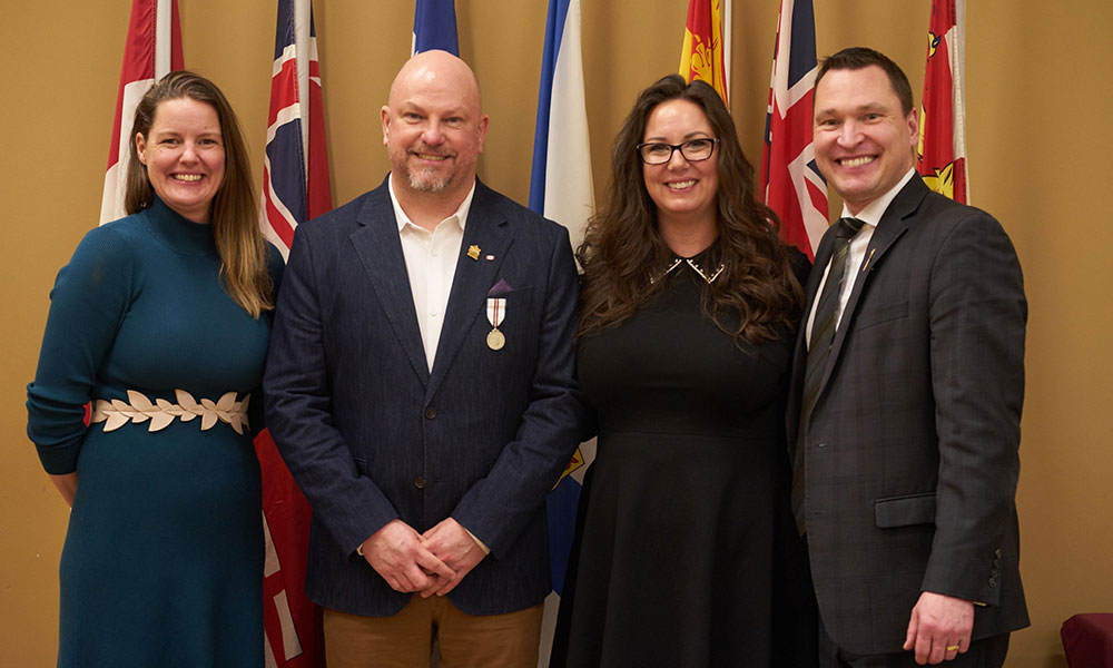 nait grad and Alberta TV industry advocate Kelly Wolfert receiving Queen Elizabeth II's platinum jubilee medalt