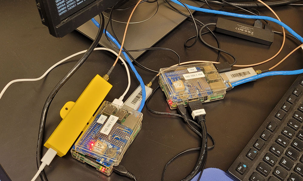photo of two raspberry pi computers receiving signals from the radio receiver of NAIT's motus wildlife tracking system