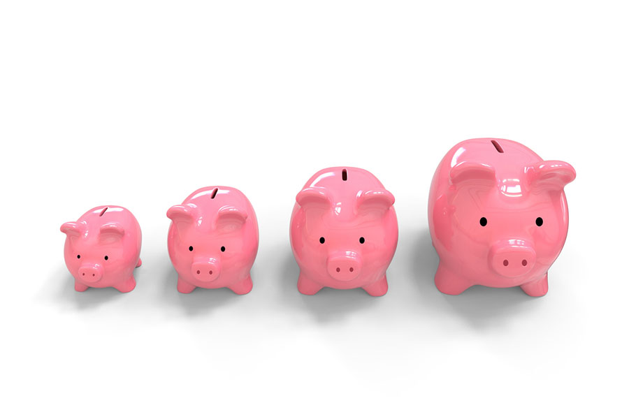 four pink piggy banks of increasing size