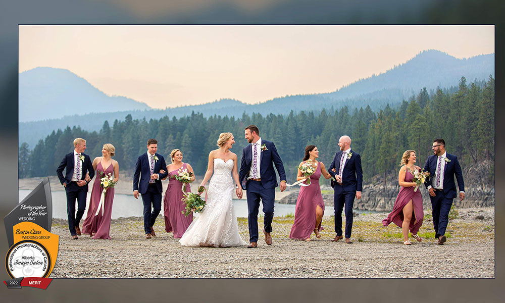 award-winning wedding photo by railene hooper featuring a wedding party on a beach