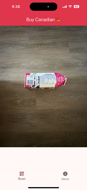 an empty milk carton lying on a wood floor
