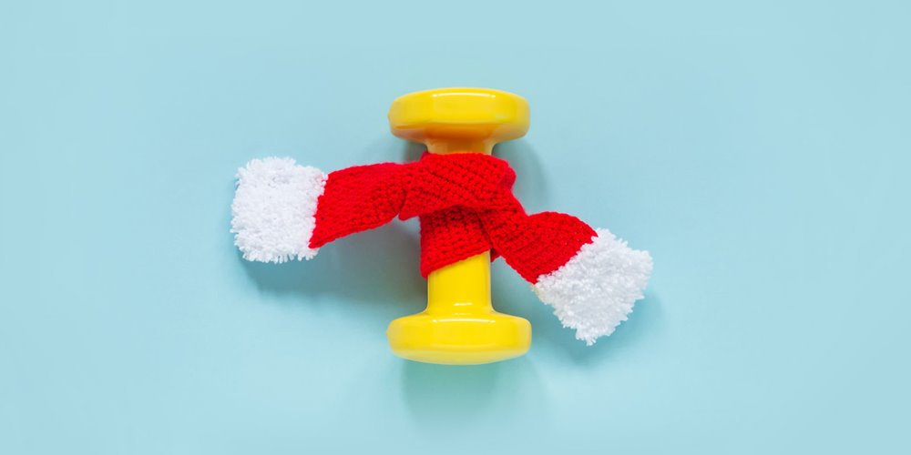 Alla-Semenova/istockphoto.com yellow barbell wrapped in red and white scarf