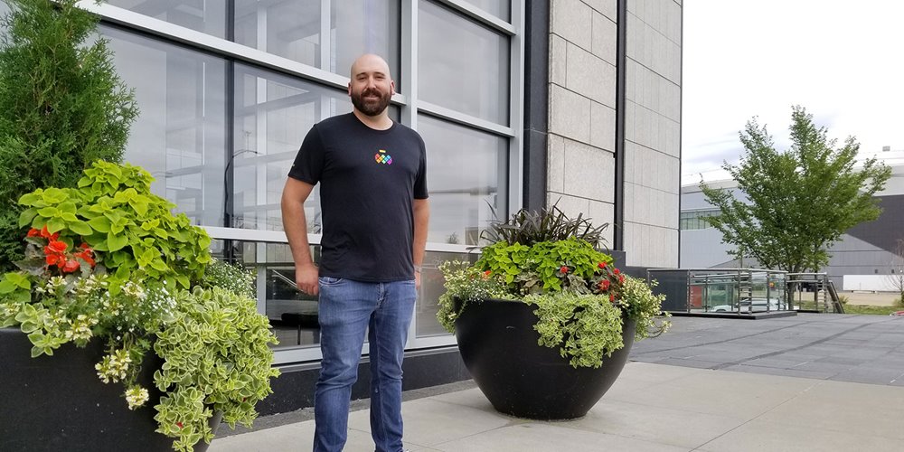 milkcrate owner and chef steven brochu standing outside a building in downtown edmonrton