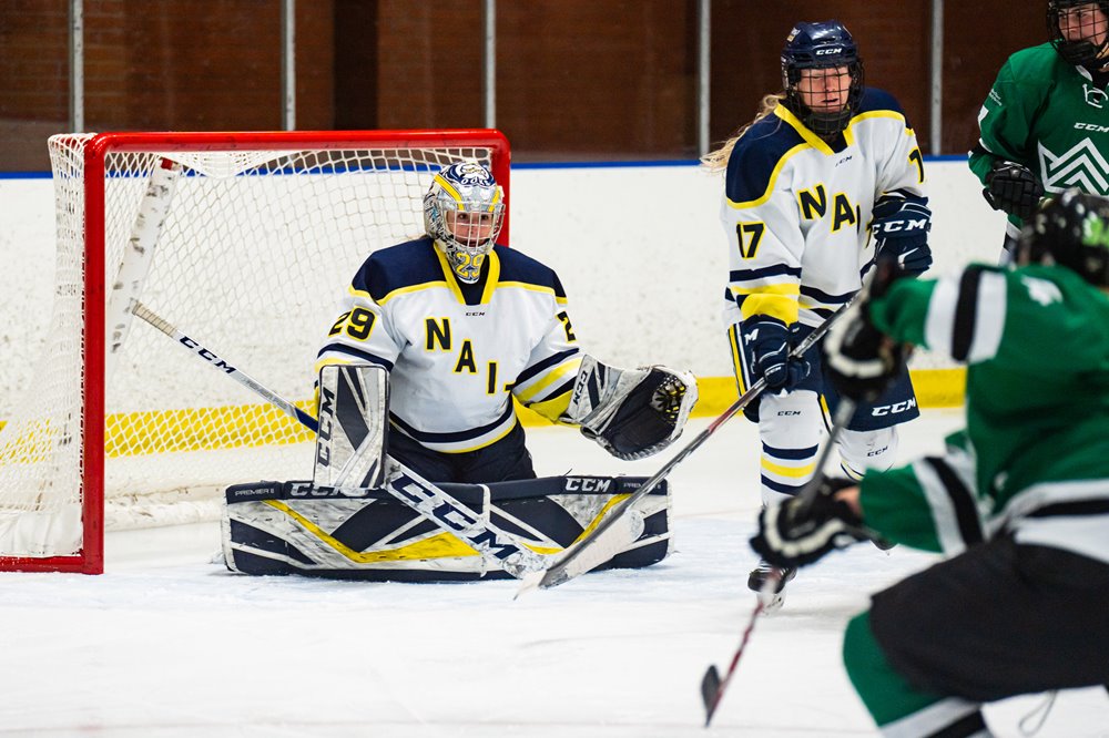 kaitlyn slator in net for nait women's ooks hockey team