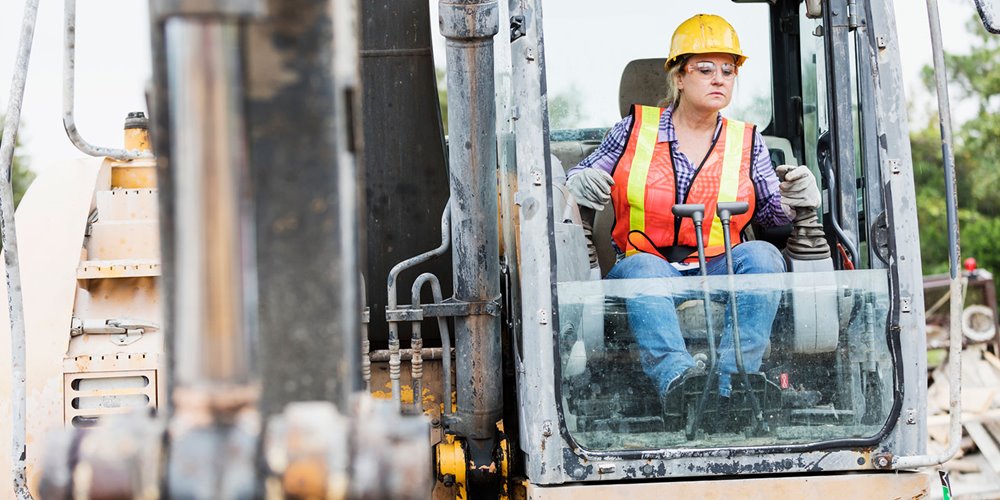 woman operating heavy machinery