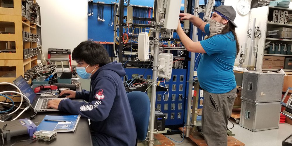 nait students work on wireless internet system in NAIT lab