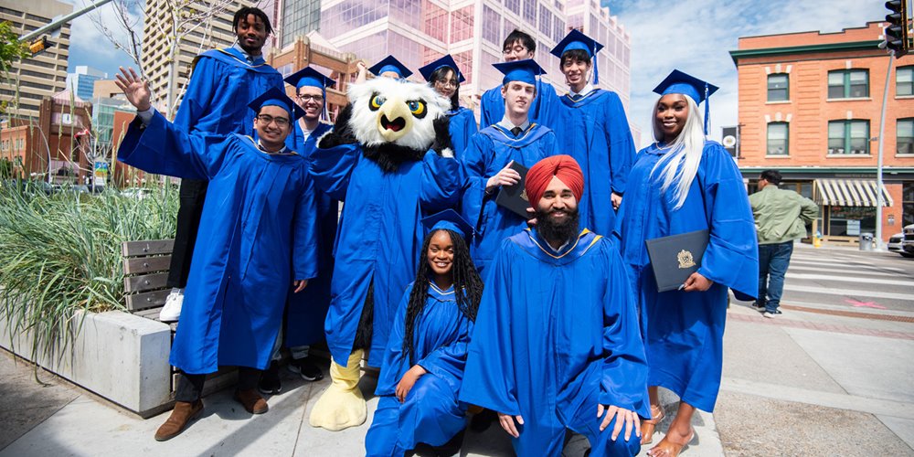 photo of NAIT grads outside at convocation 2024